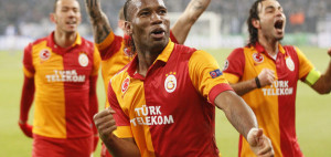 Galatasaray's Didier Drogba and team mates celebrate their victory over Schalke 04 following their Champions League soccer match in Gelsenkirchen