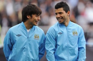 David Silva and Sergio Aguero of Manchester City share a joke-840121