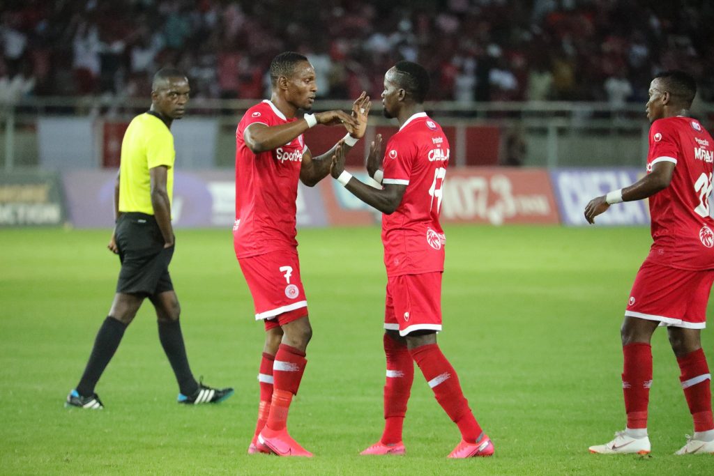 Clatous Chama and Chris Mugulu celebrating the third goal of Simba