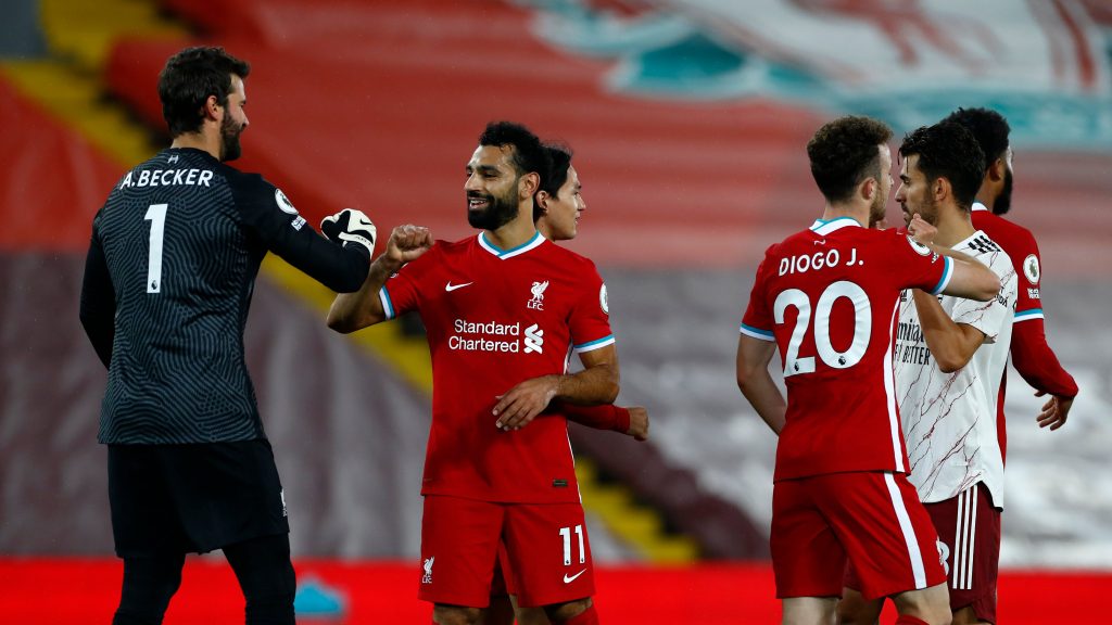 Reds congratulating one another after the game.