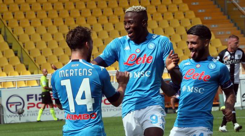 Victor Osimhen celebrating with team-mates dries Mertens and Lorenzo Insigne.