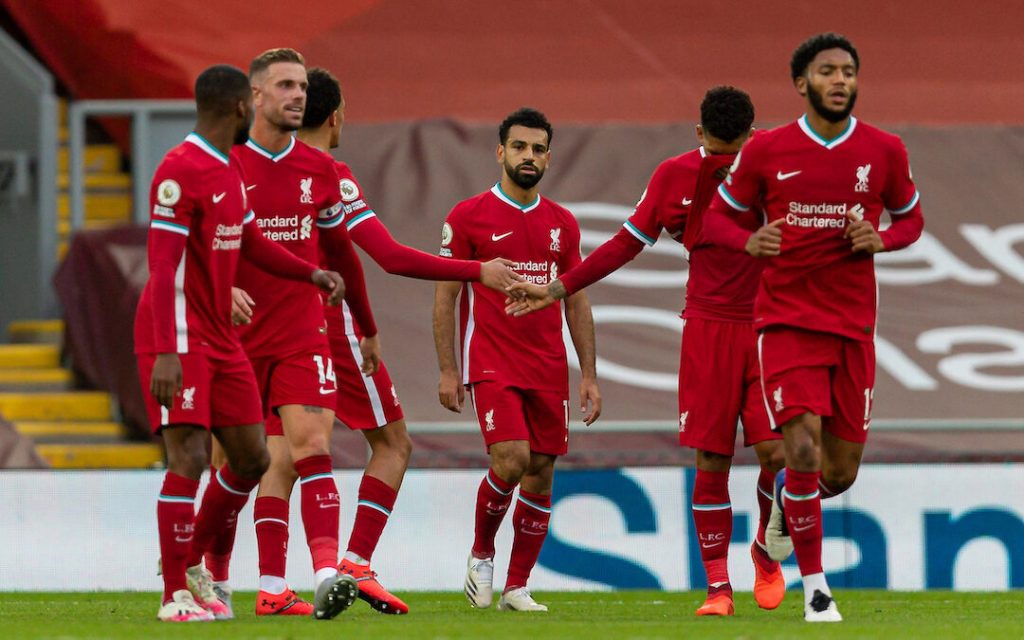 Liverpool players celebrating after Mo Salah scored the third goal to hand Reds the lead 3-2 against Leeds United in the opener of Premier League.