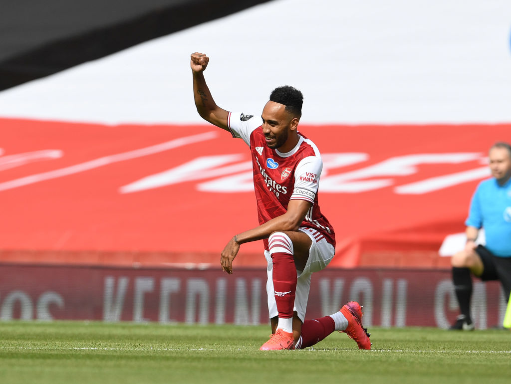 Aubameyang joins other players to take the knee in support of Black Lives Matter.