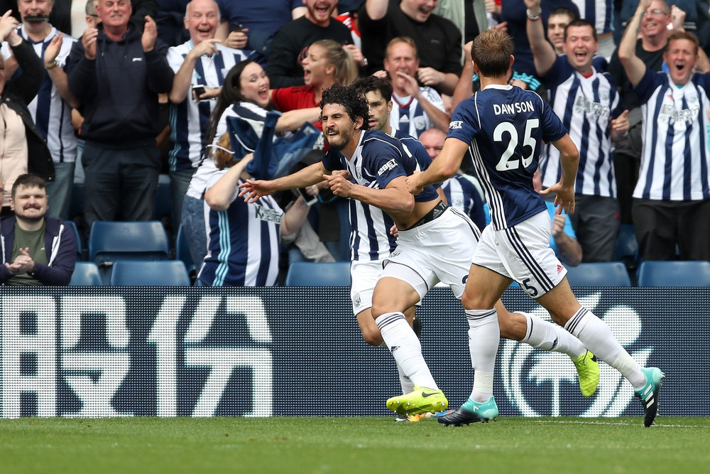 Ahmed Hegazi celebrating a goal with teammate at West Brom.