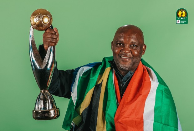 Pitso Mosimane with CAF Champions league title.