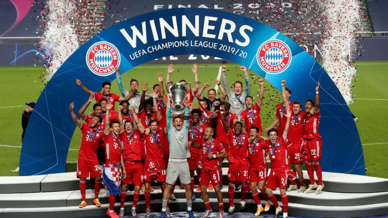 Bayern Munich celebrating the UFA Champions league trophy.