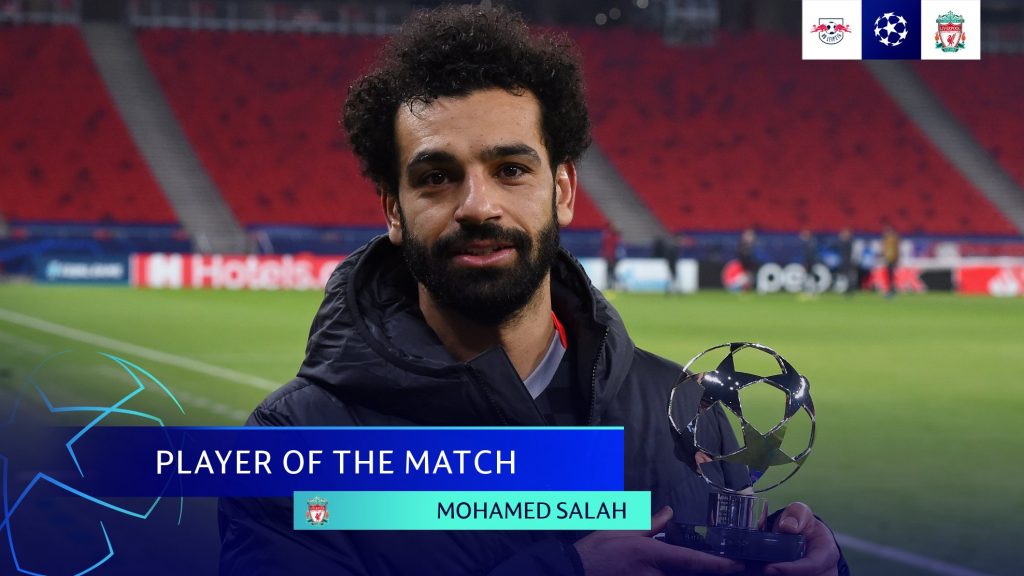 Mo Salah with the MOTM trophy.