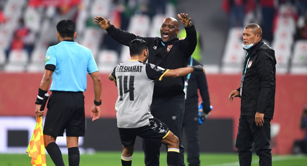 El-Shahat celebrating with Pitso Mosimane in FIFA Club World Cup.