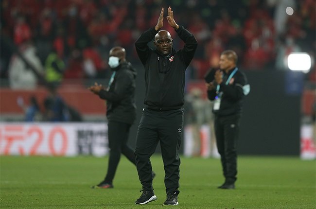 Pitso Mosimane greeting Al Ahly fans who came to watch their Bayern Munich clash.