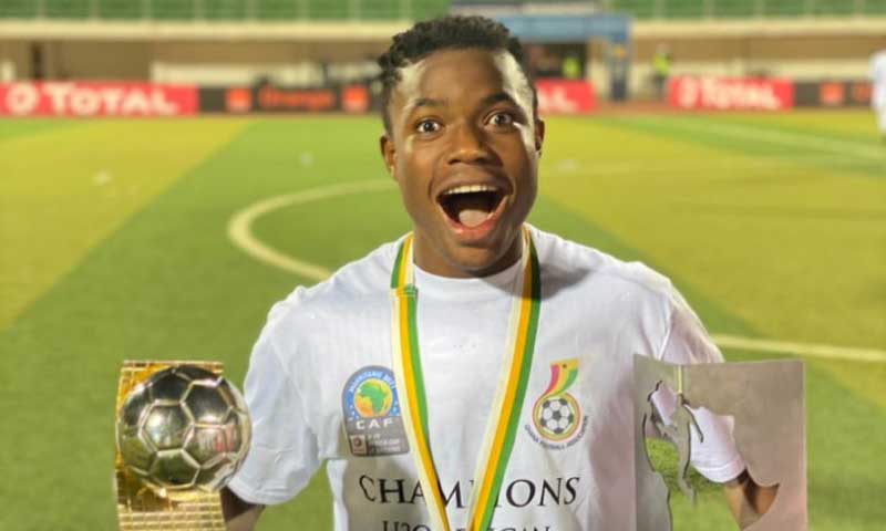 Abdul Fatawu Issahaku with U-20 AFCON trophy and Best Player one.