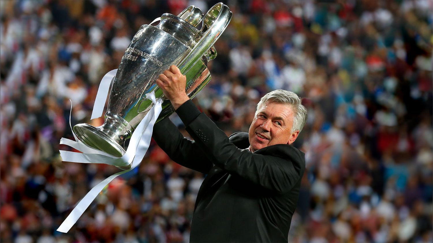  Carlo Ancelotti celebrates with Real Madrid players after winning the 2014 Champions League.