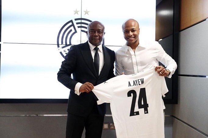 Andre Ayew and his father Dede Ayew at his unveiling ceremony.