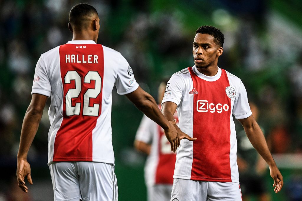 Sebastien Haller celebrating with a teammate.