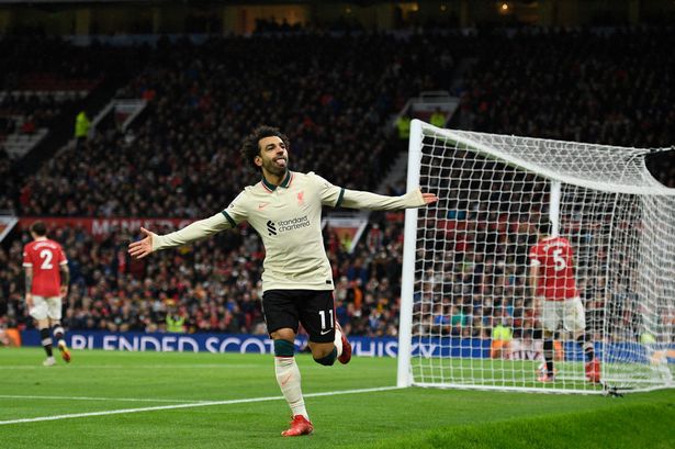 Mohamed Salah celebrating a goal at Old Trafford.