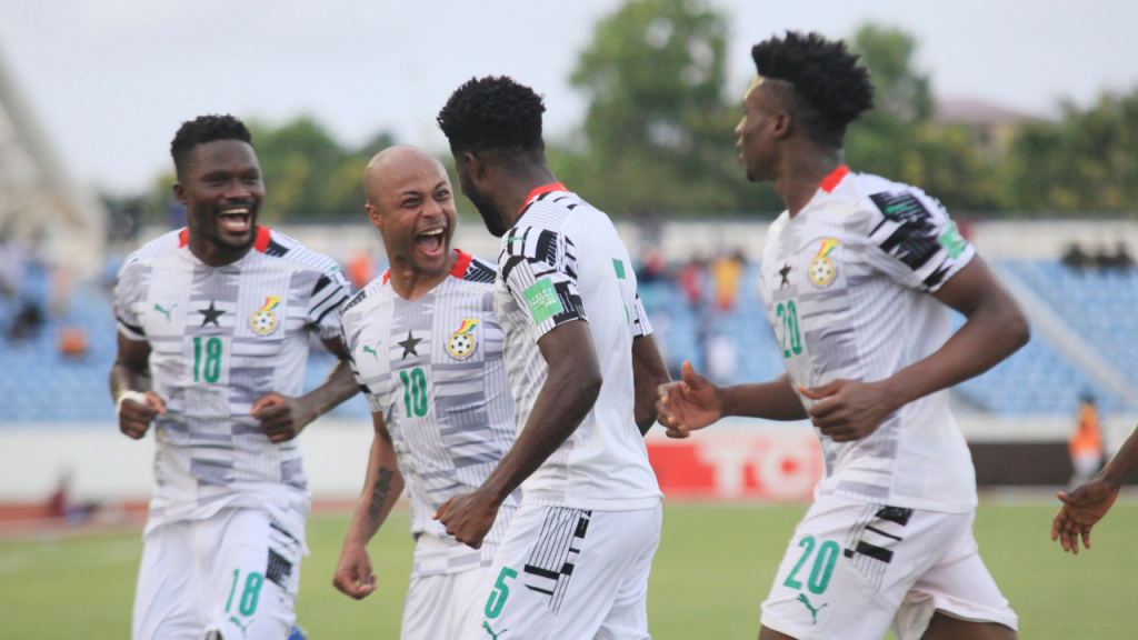 Andre Ayew celebrating with his teammates.