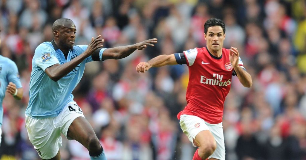Yaya Toure vs Mikel Arteta during a Man City vs Arsenal clash.