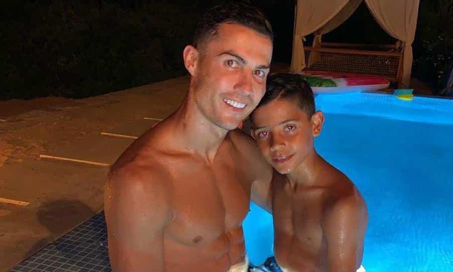 Cristiano Ronaldo and Cristiano Jr at the pool.