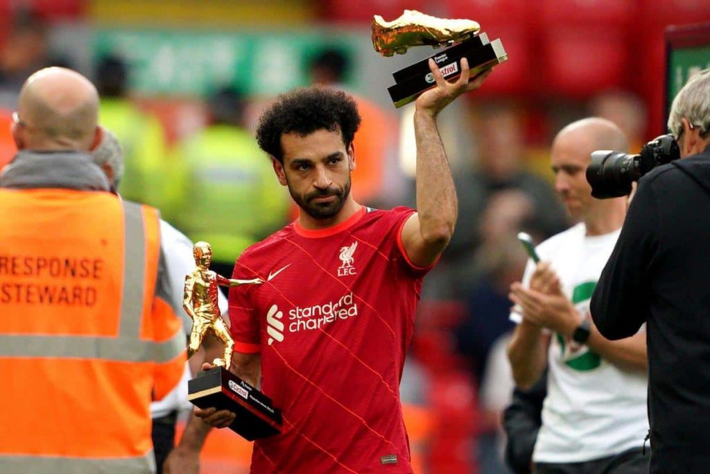 Mohamed Salah with his Premier League Golden Boot and Mos Assists Awards.