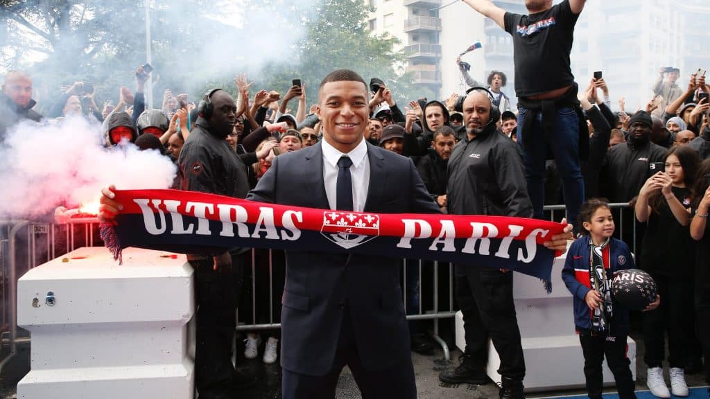 Kylian Mbappe celebrating his extension with PSG fans on Monday.