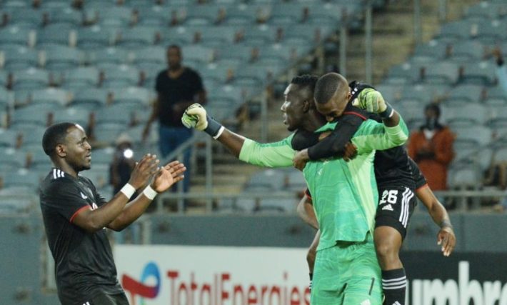 Orlando Pirates players celebrating against Al Ahly Tripoli.