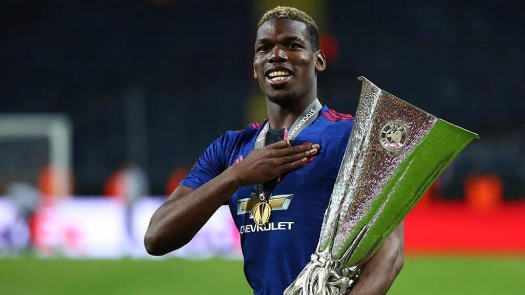 Paul Pogba celebrating with the 2016/17 Europa league trophy.