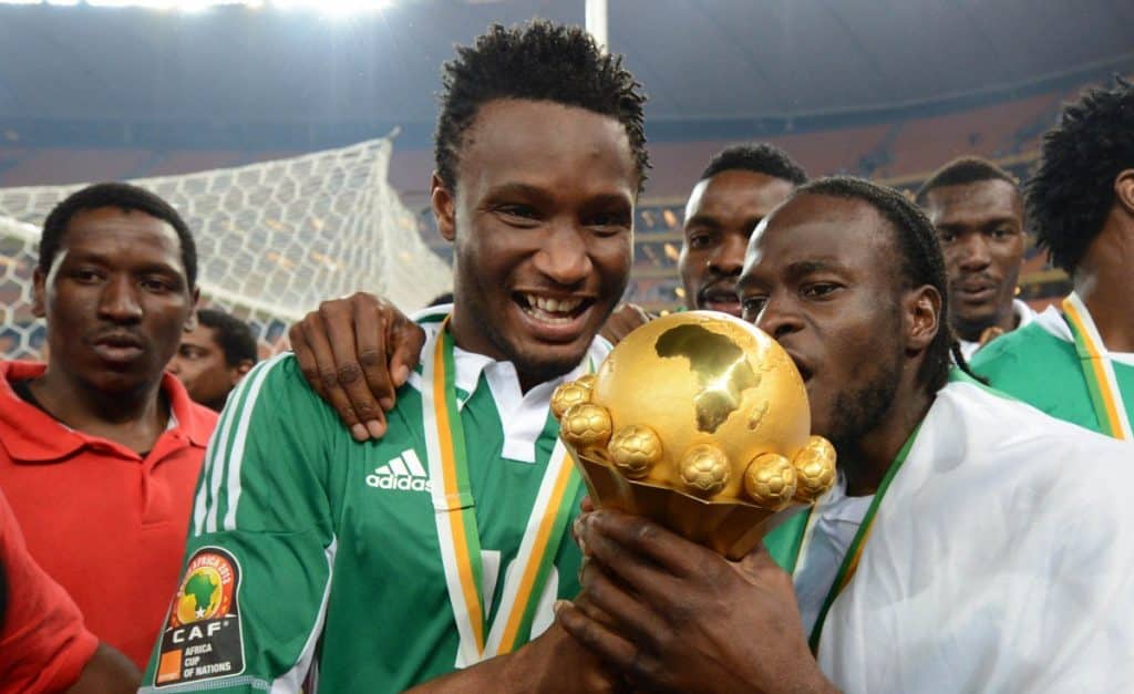 John Mikel Obi celebrating after Nigeria's triumph in AFCON 2013.