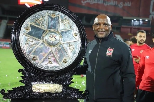 Pitso Mosimane with the Egyptien Premier League trophy.