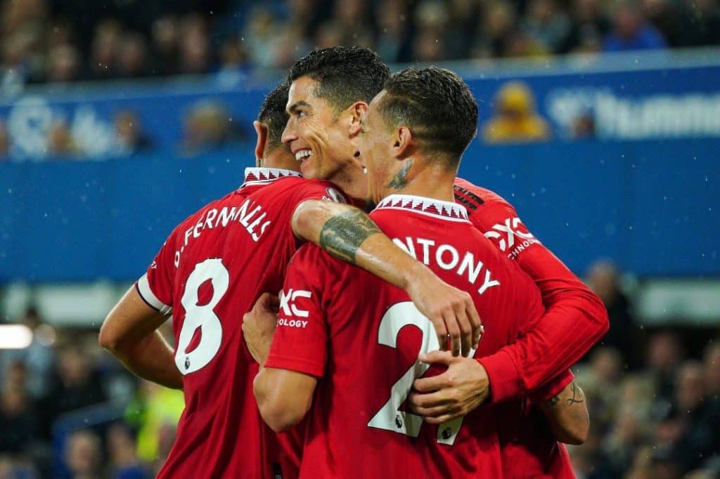 Cristiano Ronaldo celebrating his goal with his teammates.