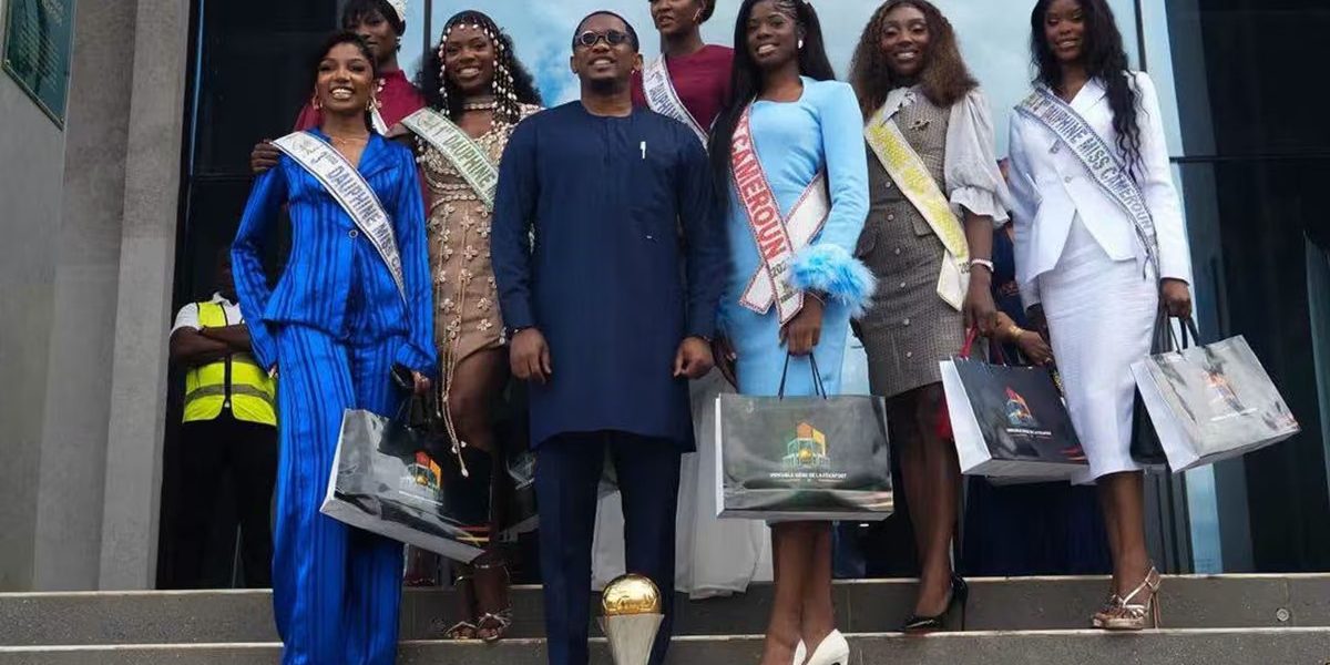 Miss Cameroon visits FECAFOOT and admires AFCON trophy